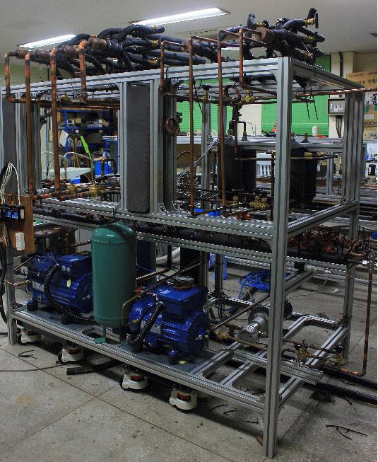 R744와 R404A용 캐스케이드 냉동시스템과 R404A용 2단 압축 냉동시스템의 성능 비교에 관한 연구